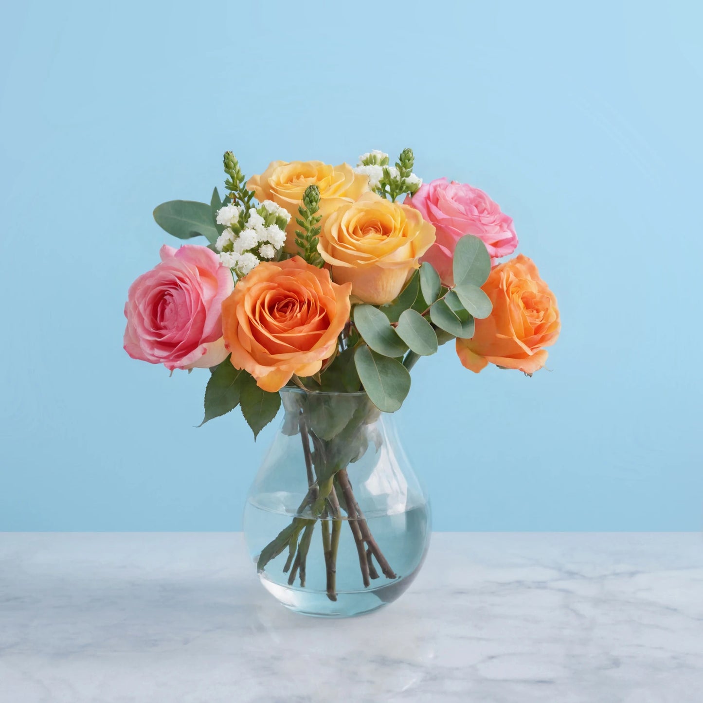 Soft Elegance: A Bouquet of Roses and Eucalyptus