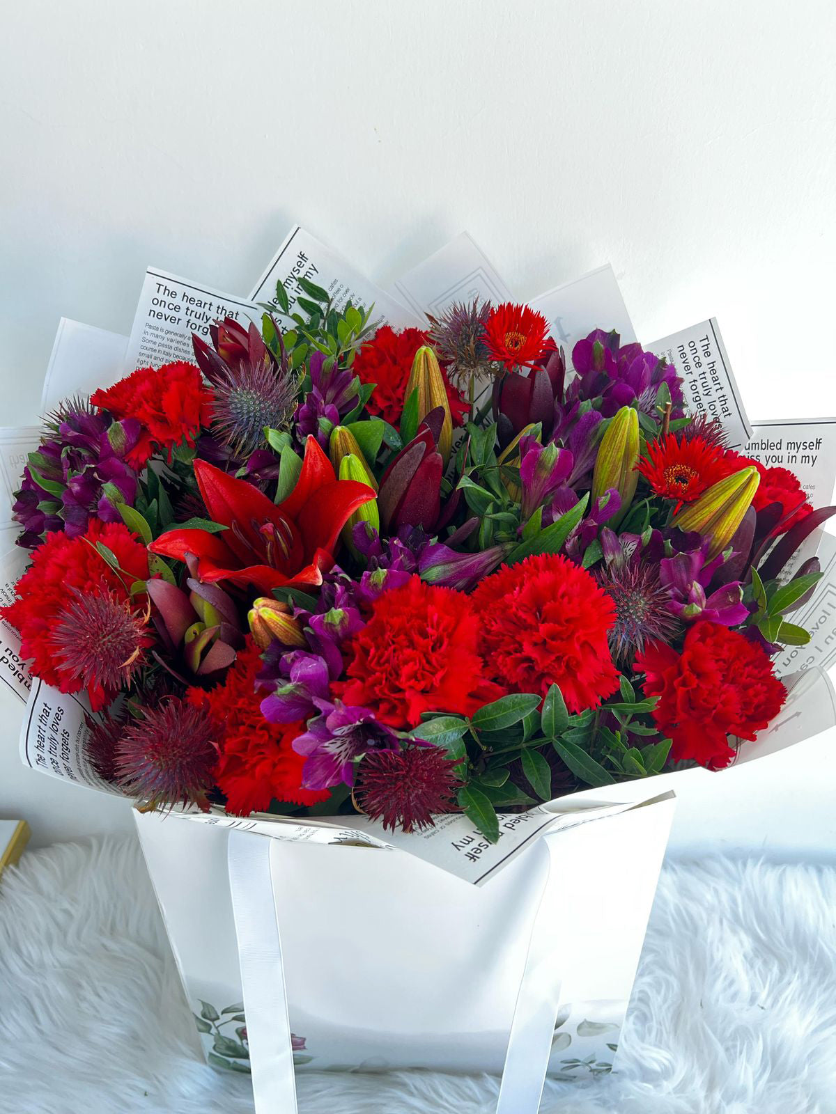 Signature Red Carnations with Handpicked Florals