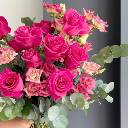 A lovely Bouquet With Hot Pink Roses