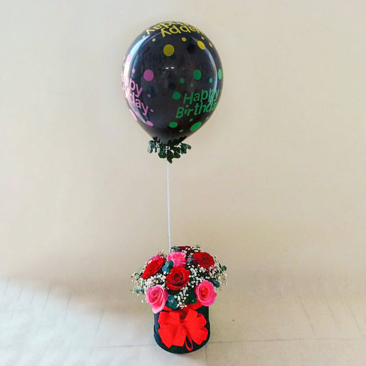 Elevate your gifting experience with our Flowers in the Box with Balloons collection. Each box is a delightful ensemble of fresh blooms adorned with colorful balloons, creating a whimsical and celebratory display. Whether for birthdays, anniversaries, or just to spread joy, this charming combination is sure to bring smiles and make any occasion extra special.