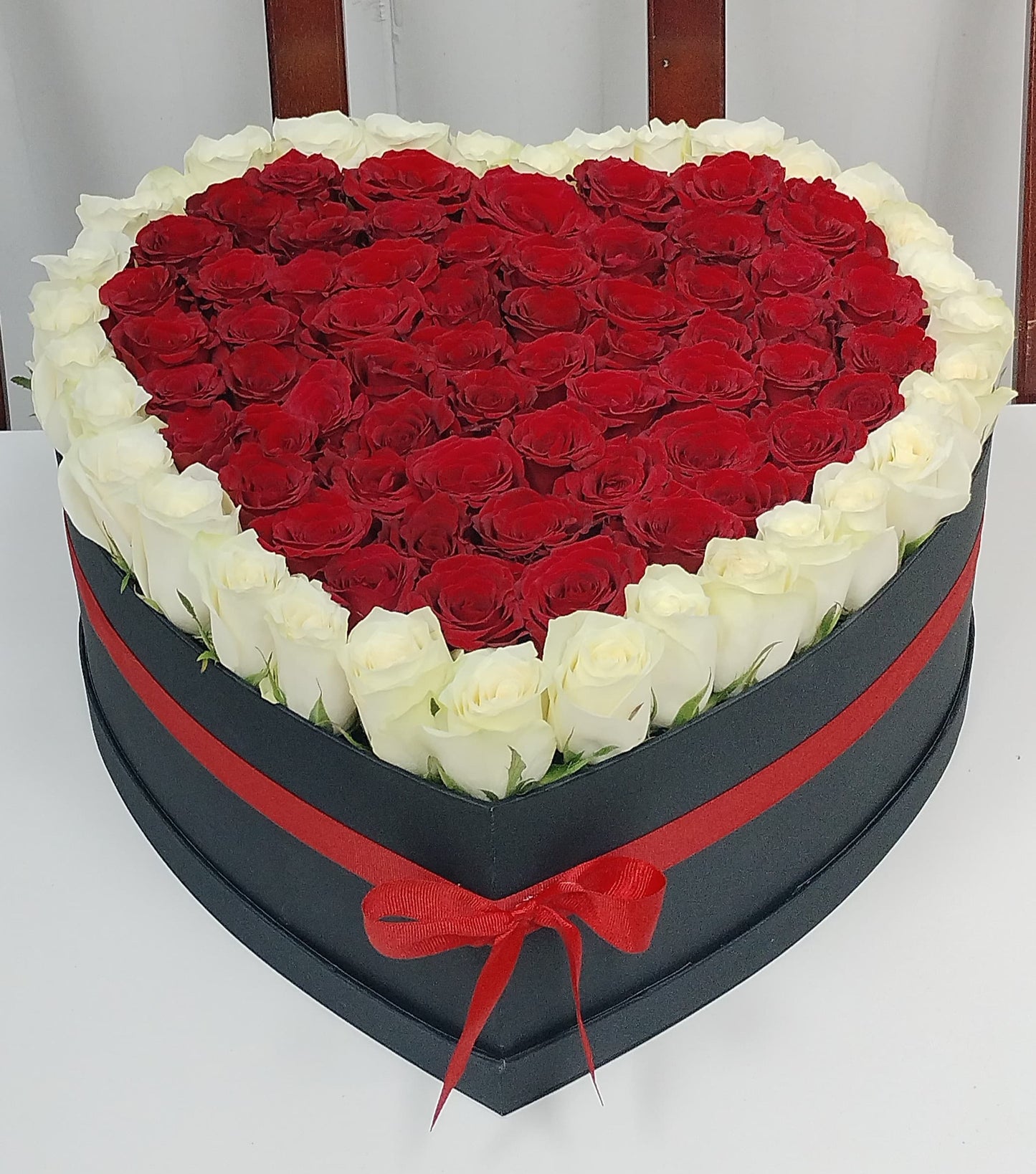 Red & White Roses in Black Heart Shaped Box