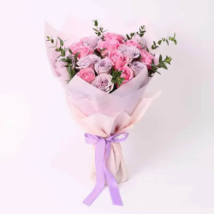 11 Pink Roses Beautifully Wrapped and a Ribbon Bow