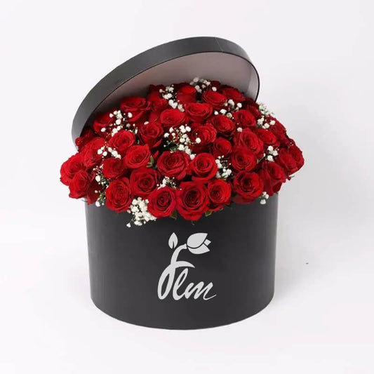 41 Red Roses Gypso Arranged in a Round Black Box <span data-mce-fragment="1">Red Roses Gypso flowers present an enchanting fusion of classic romance and modern elegance. These stunning blooms combine the timeless allure of red roses with delicate accents of gypsophila, creating an arrangement that captivates with its beauty and charm.</span><br>