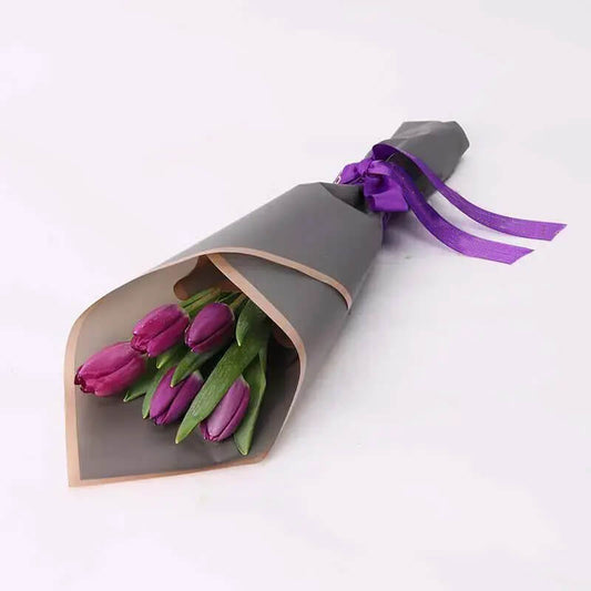 "Elevate any space with the timeless allure of our 5 Purple Tulips Bouquet. Each stem embodies grace and sophistication, creating a captivating display. Symbolizing admiration and elegance, this bouquet is perfect for expressing heartfelt sentiments or adding a touch of luxury to any setting. Embrace the enchantment of these exquisite blooms."