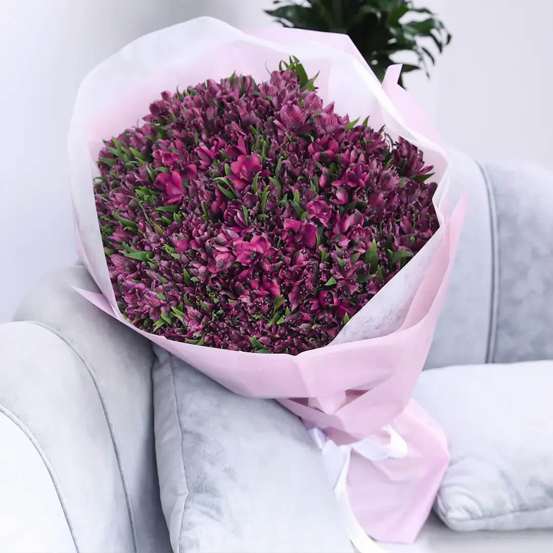 This bouquet consists of 100 stems Alluring Purple Alstroemeria.<br data-mce-fragment="1">NOTE: When your flowers arrive in closed bud form, it’s okay. They just need a trim and some water, and they’ll begin to bloom beautifully in no time!