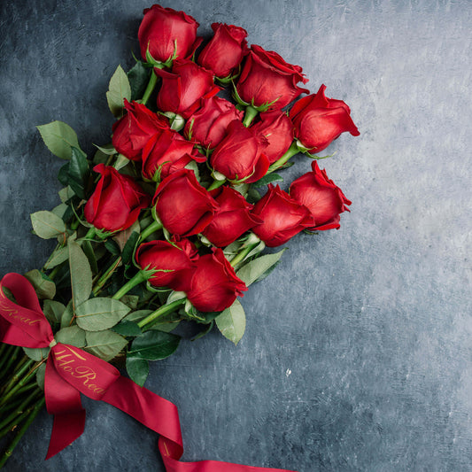 Classic Red Rose Bouquet: Timeless elegance embodied in scarlet petals, evoking passion, romance, and enduring love with every bloom.