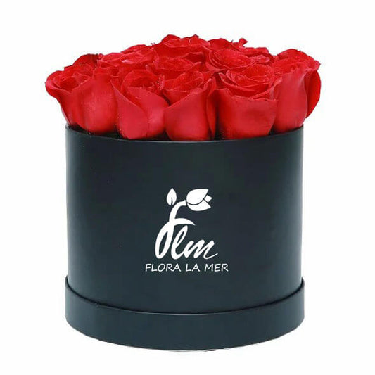Embrace romance and sophistication with our Red Rose and Black Box. Each arrangement exudes timeless elegance, pairing velvety red roses with a sleek black box for a striking contrast. Perfect for expressing love, admiration, or gratitude, this gift is sure to captivate hearts and leave a lasting impression on any recipient.